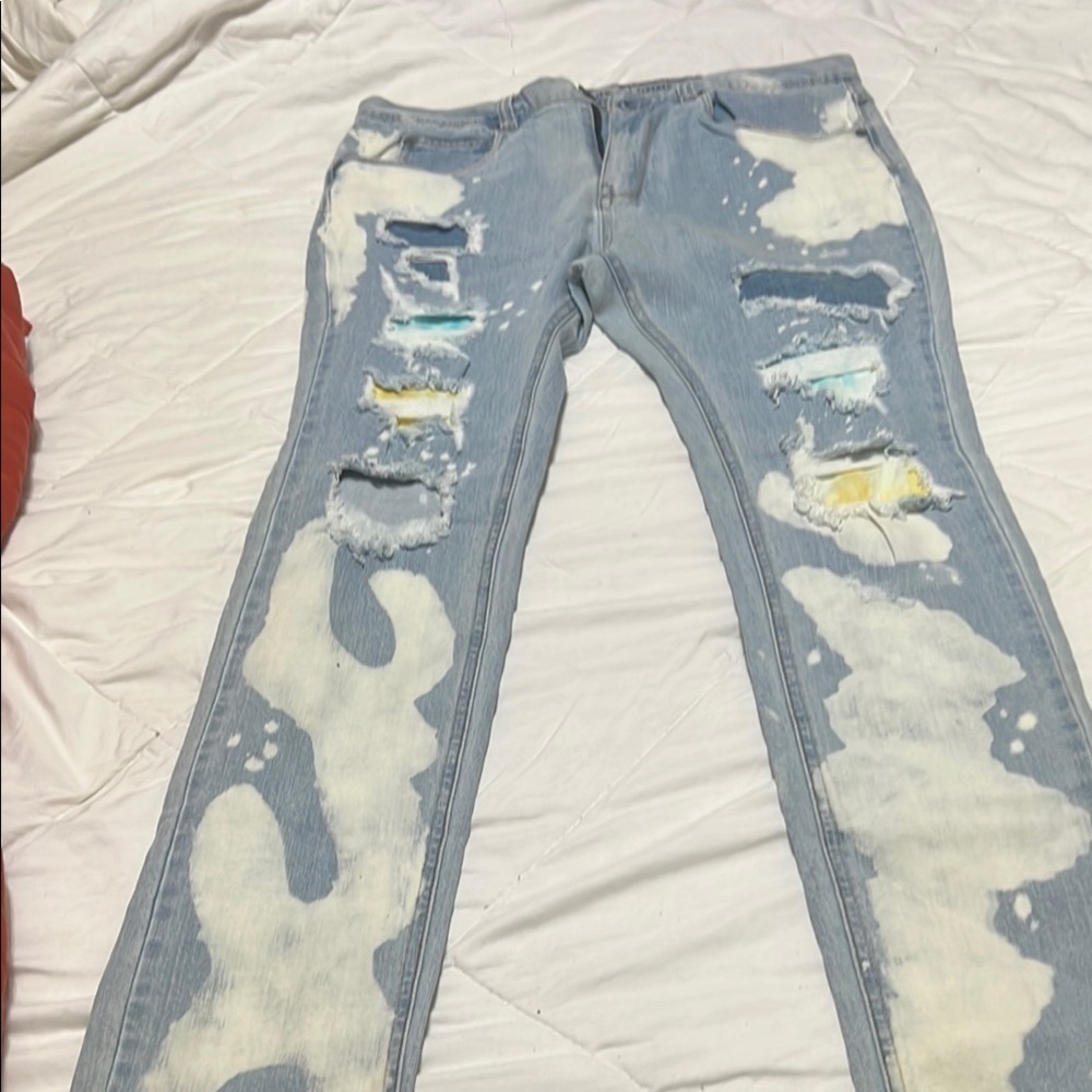 Blue Skinny Distressed Jeans with Asymmetrical Rips